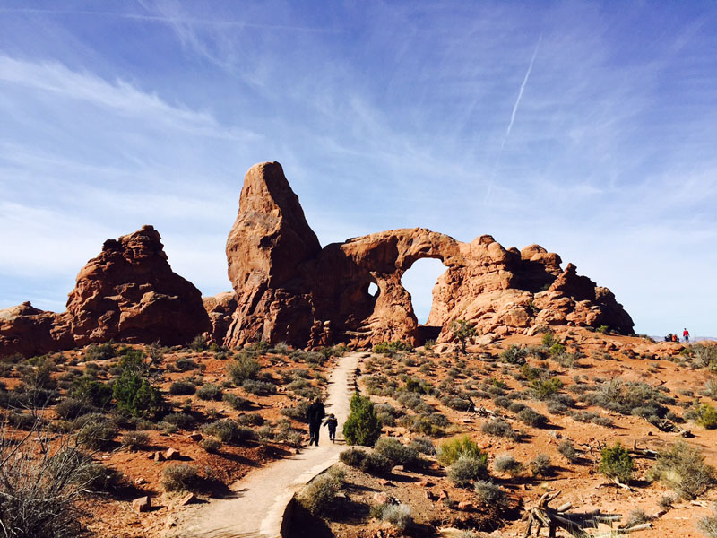 Reuben-and-Lee-Walking-in-Arches-National-Park